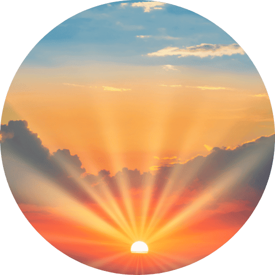 4 - Daytryp RX A circular image of a sunrise with sun rays extending upwards through clouds.