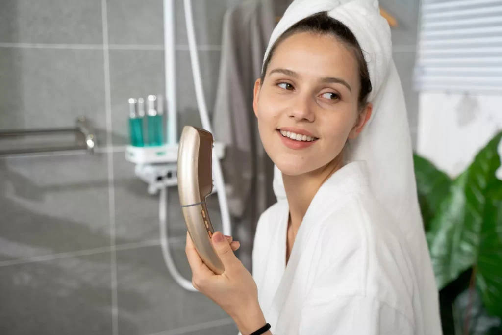 Woman in skincare routine representing healthy aging and improved wellness supported by NAD+ therapy