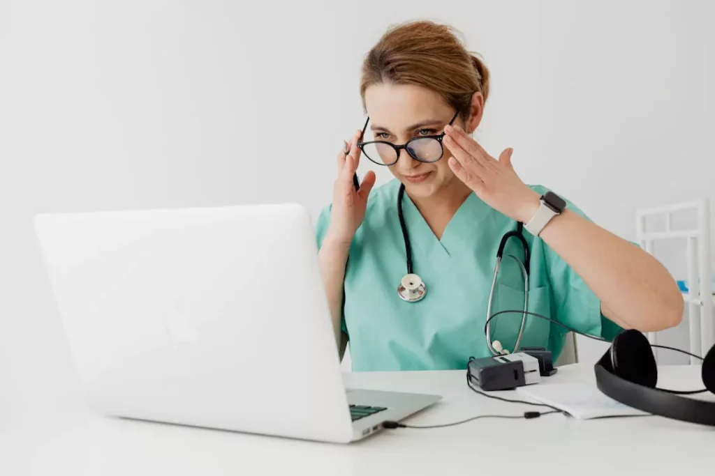 nad-therapy-online-consultation-ms - Daytryp RX doctor using a laptop for online consultation supporting NAD+ therapy for multiple sclerosis care