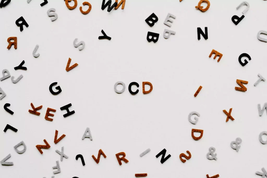 ketamine-for-ocd-intrusive-thoughts - Daytryp RX letters arranged to spell OCD, representing intrusive thoughts and obsessive-compulsive disorder symptoms