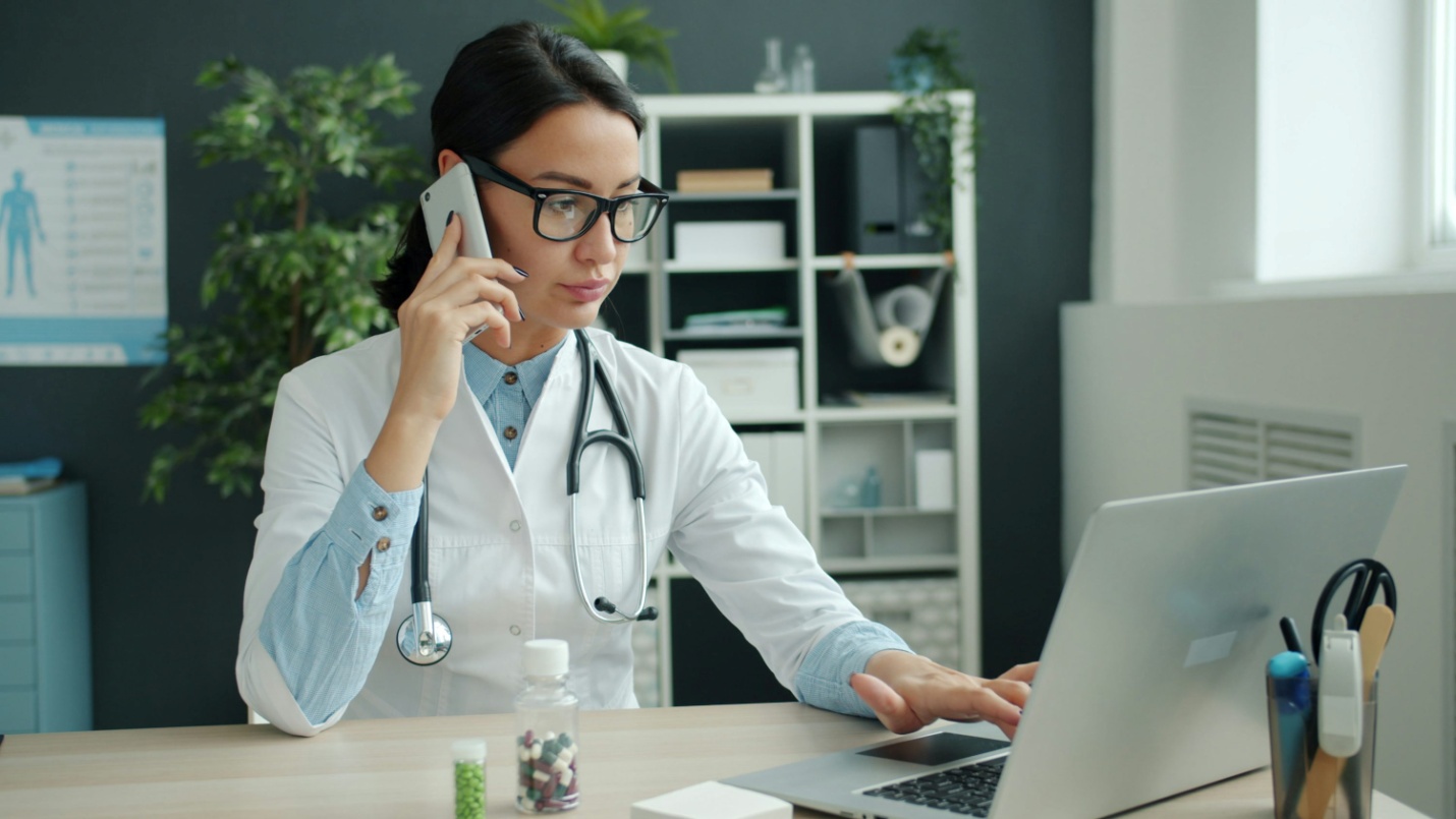 A doctor conducting a consultation online