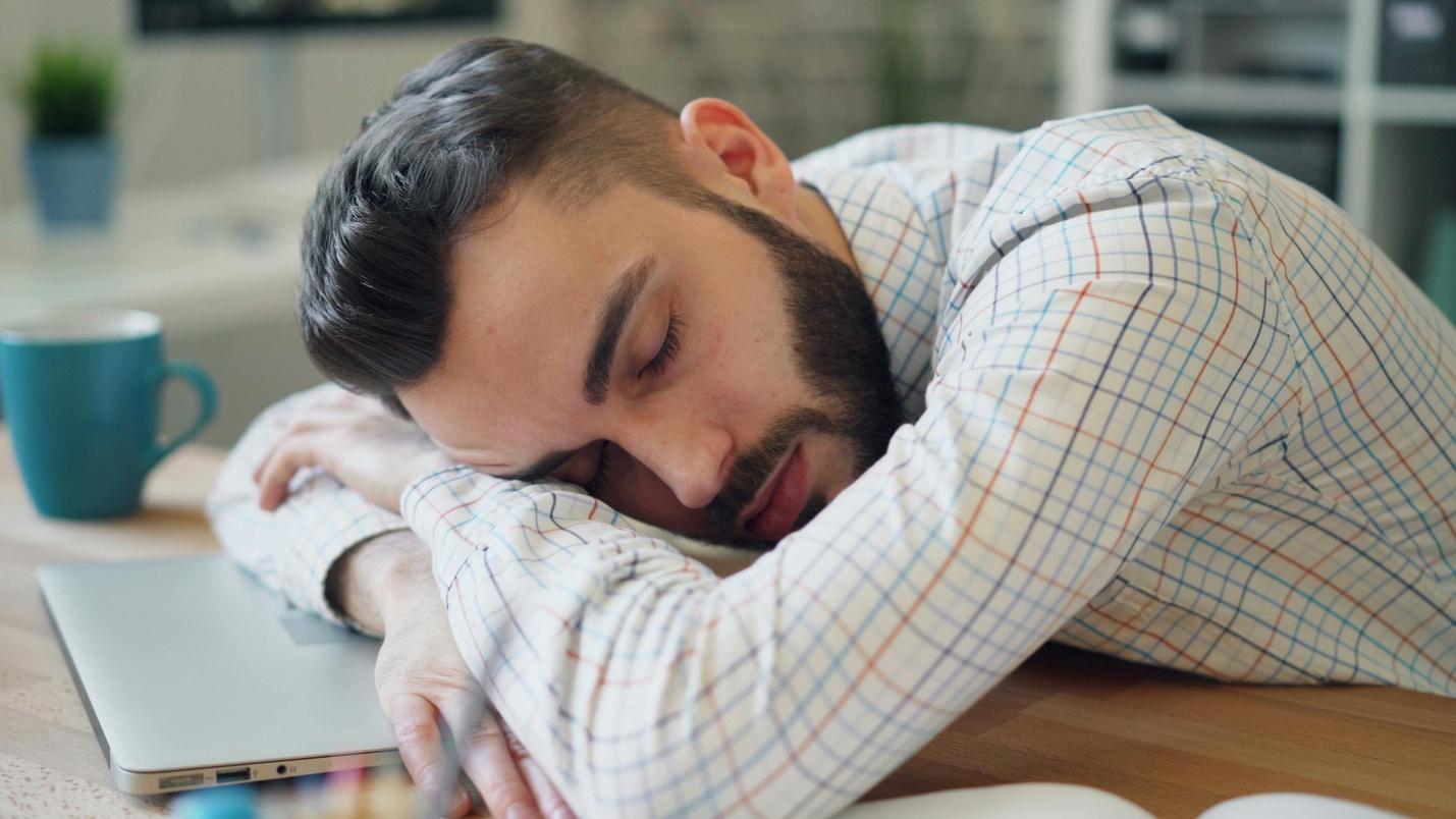 A person sleeping on table