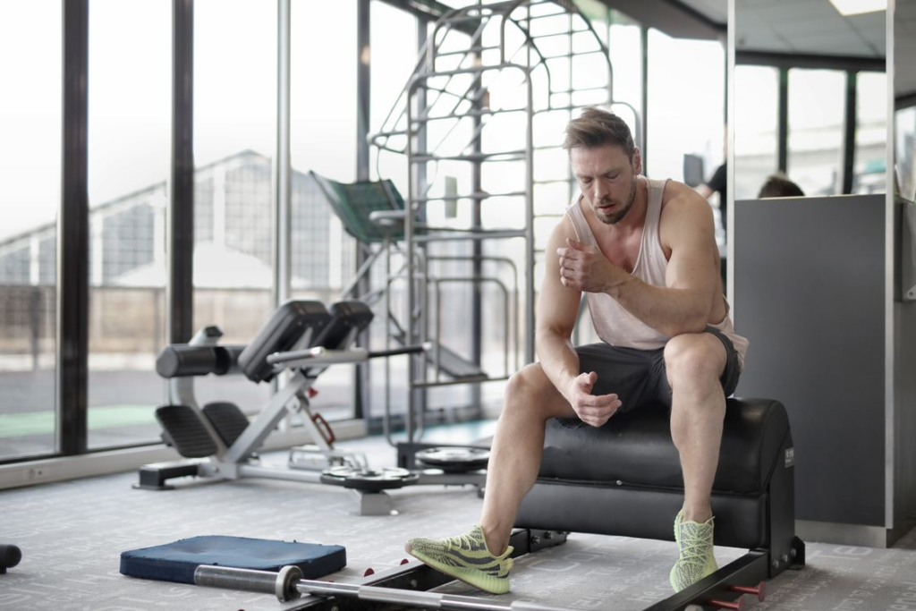 testosterone-replacement-therapy-hormone-production - Daytryp RX man resting after a workout representing testosterone replacement therapy and natural hormone production