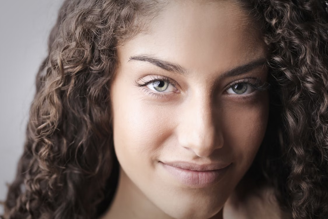 A person with curly hair