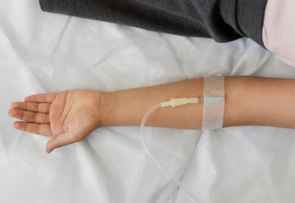 Patient receiving at-home ketamine therapy in a comfortable, private setting