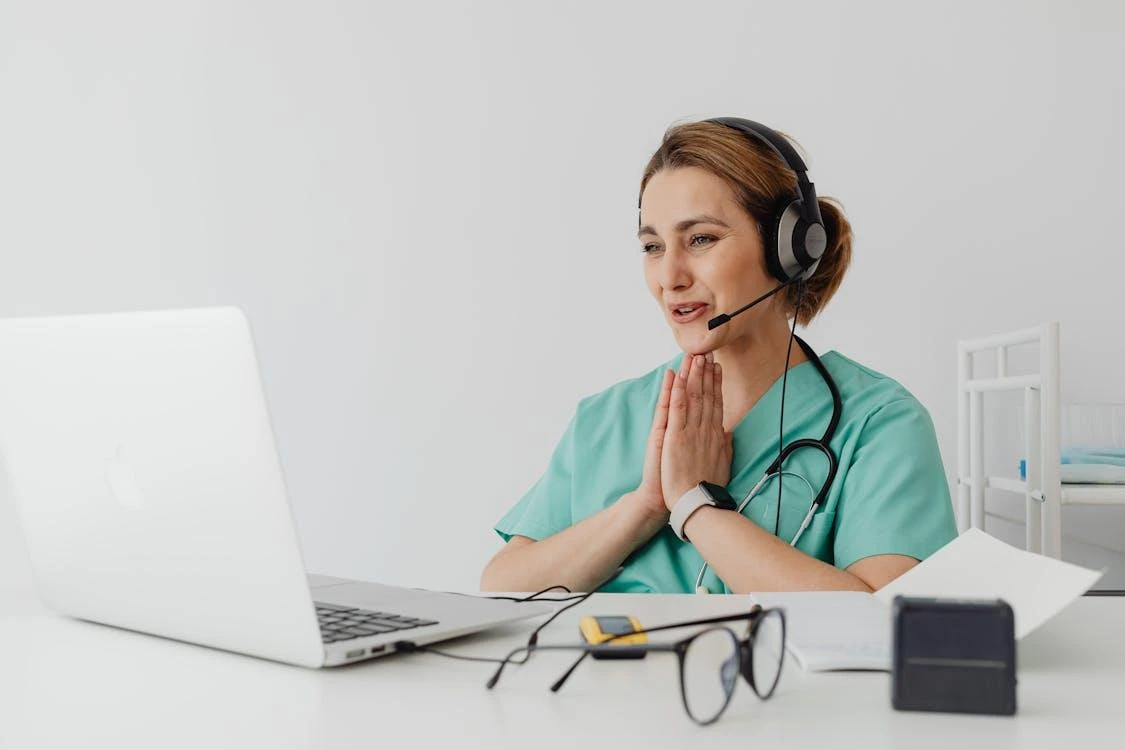 Doctor providing telehealth consultation.