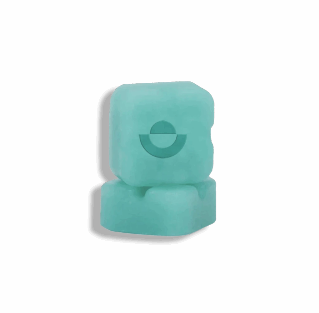 Two stacked turquoise lozenges with a circular logo, representing wellness supplements or edibles.
