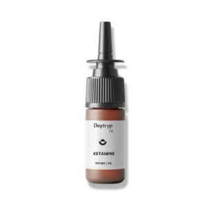 Daytryp Rx ketamine nasal spray bottle labeled 100 mg/mL, used for mental health therapy support.