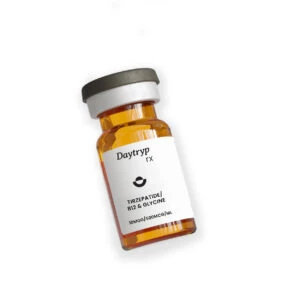 Clear glass vial with label reading "Daytryp rx TIRZEPATIDE/B12 & GLYCINE 10MGG/500MCG/ML".