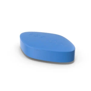 Close-up of a blue Sildenafil tablet used to treat erectile dysfunction
