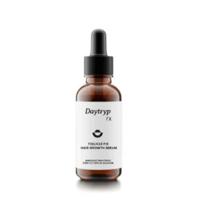 Amber glass dropper bottle of Daytryp rx Follicle Fix Hair Growth Serum with Minoxidil and Finasteride topical solution.