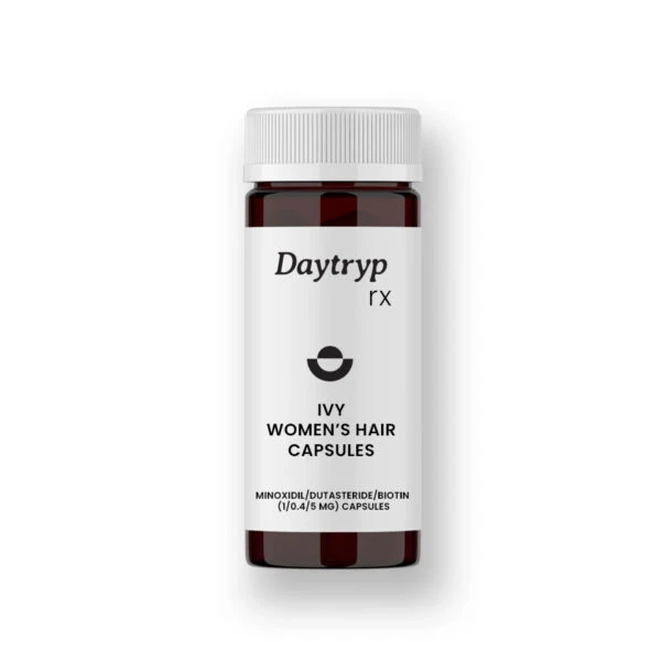 Amber glass bottle of Daytryp rx Ivy Women's Hair Capsules, containing Minoxidil, Dutasteride, and Biotin.